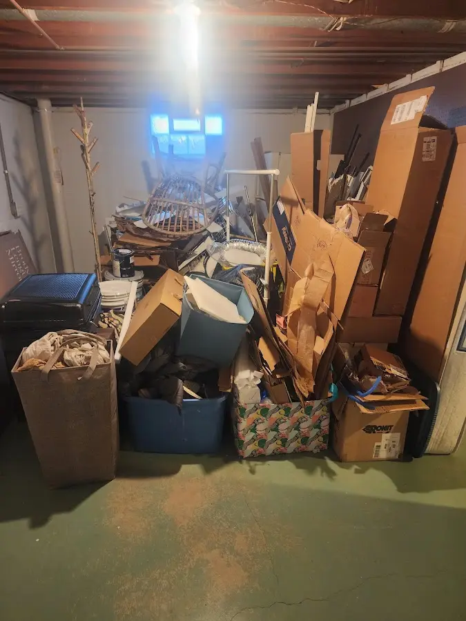 Roll-off dumpster container at job site for 2 Yard Dumpster Rental in Irvington